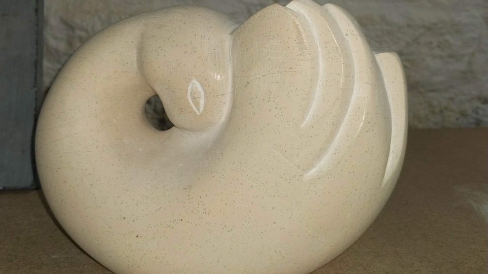 small deco-style curlew hand-carved from stone